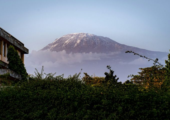 a view of a snow covered mountain from a building